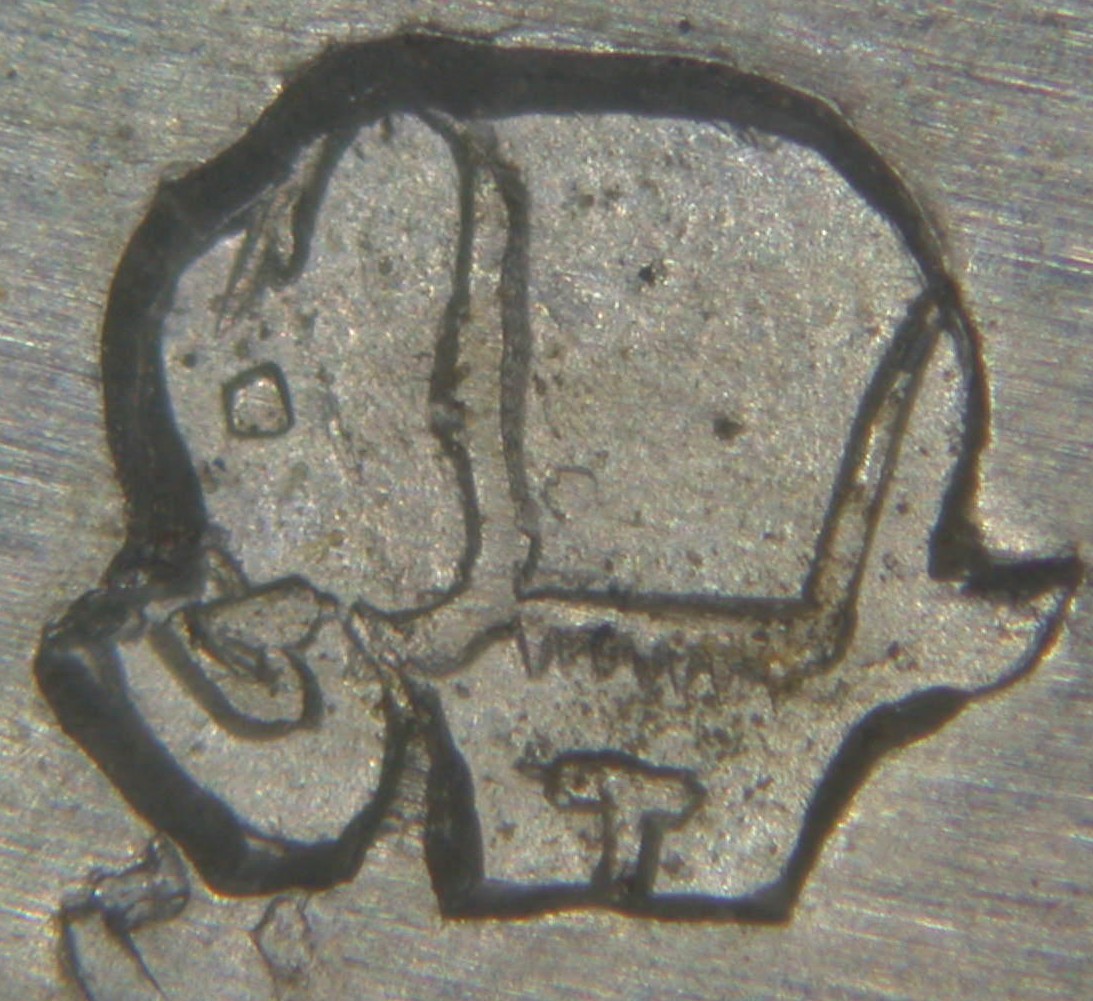 Przykład znaku imiennego: lewy profil słonia w kwadratowym obrysie